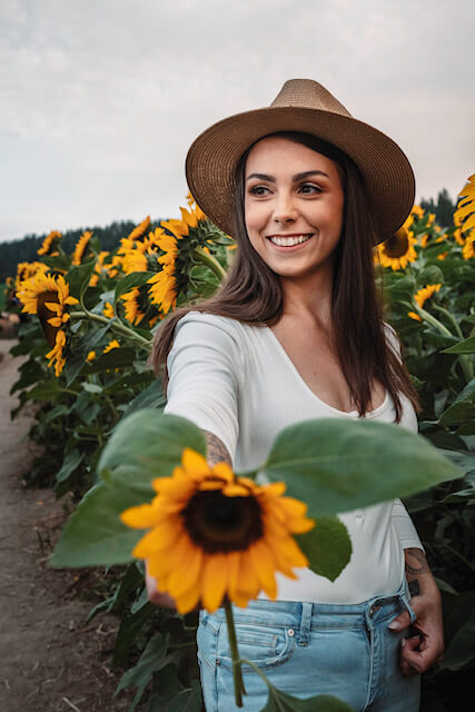 woman sunflowers